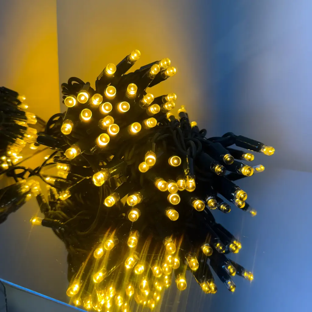 PROfesionali lempučių girlianda POLAMP, 10m (5+5), 100 LED, klasikinė balta, žaliu laidu, IP67